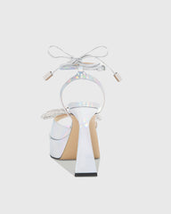 Rina Crystal Bow Lace Up Platform Flared Heels In Silver